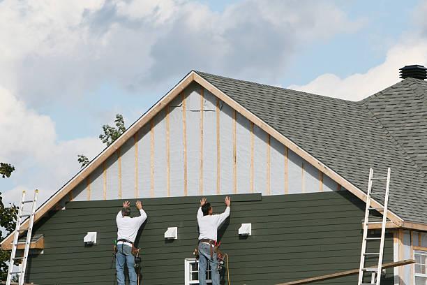 Professional Vinyl Siding technician working in Rossiter, PA
